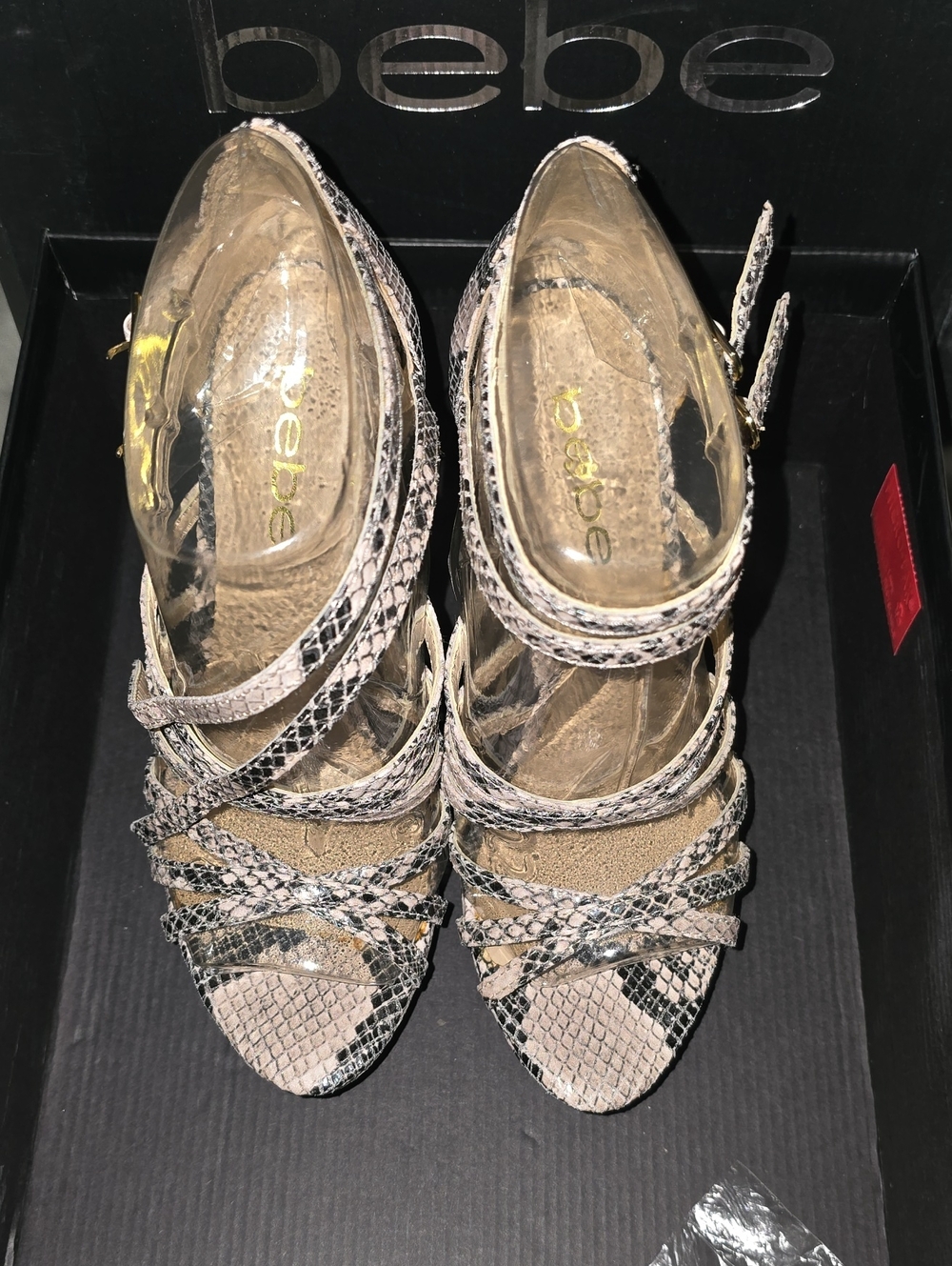 bebe Bastlova Snake-Embossed Strappy Heels in Blush and Black